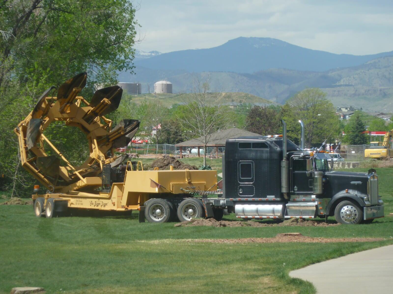 Tree transplanting service being conducted using "The Bigger Dipper"